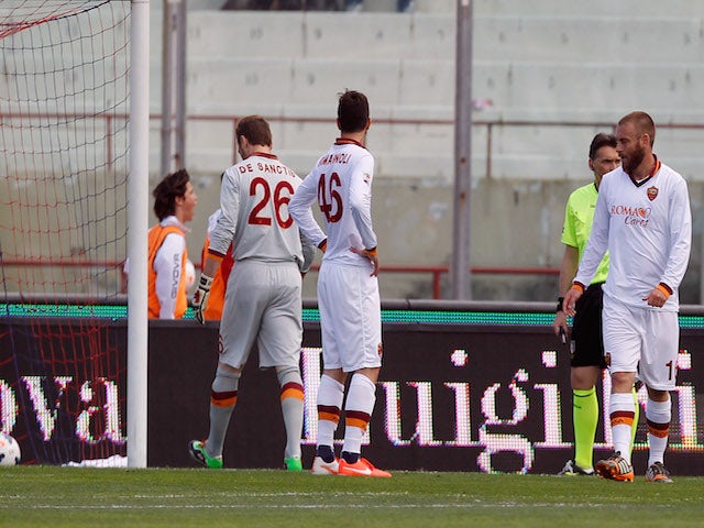 Players of Roma show their dejection during the Serie A match between Calcio Catania and AS Roma at Stadio Angelo Massimino on May 4, 2014