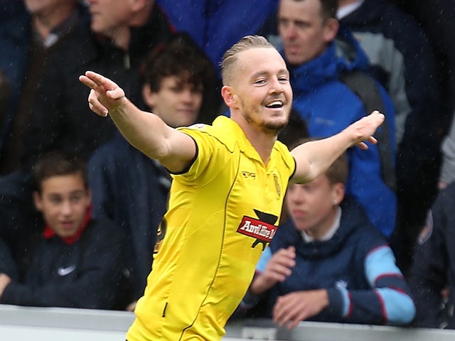 Adam McGurk of Burton Albion celebrates after scoring his sides first goal during the Sky Bet League Two Semi Final First Leg between Burton Albion and Southend United on May 11, 2014