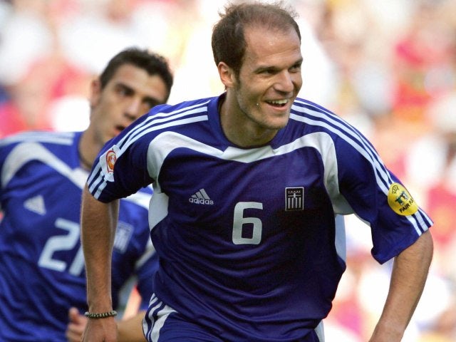 Angelos Basinas celebrates scoring for Greece at the European Championships on June 12, 2004.
