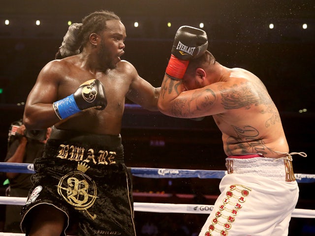 Bermane Stiverne throws a punch at Chris Arreola in their WBC Heavyweight Championship match at Galen Center on May 10, 2014