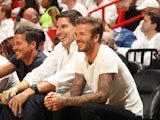 David Beckham looks on from courtside during the Eastern Conference semi-final NBA playoff game between the Miami Heat and Brooklyn Nets on May 6, 2014 