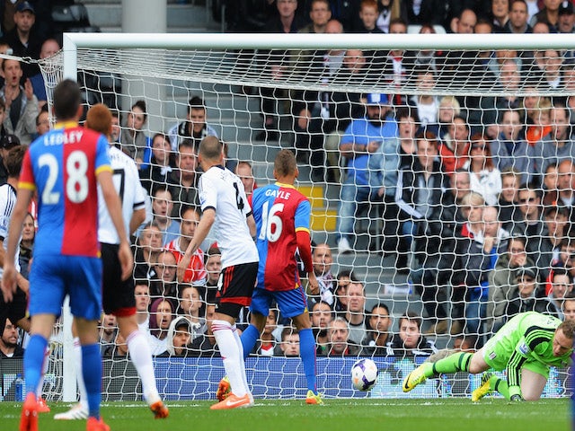 Dwight Gayle of Crystal Palace scores the opening goal during the Barclays Premier League match between Fulham and Crystal Palace at Craven Cottage on May 11, 2014