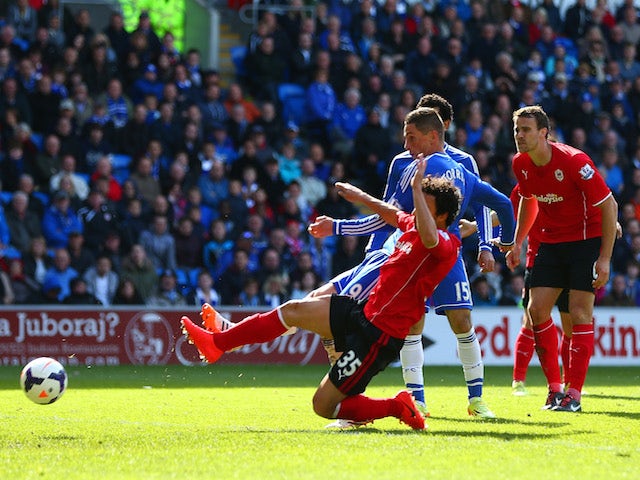 Fernando Torres of Chelsea scores their second goal during the Barclays Premier League match between Cardiff City and Chelsea at Cardiff City Stadium on May 11, 2014