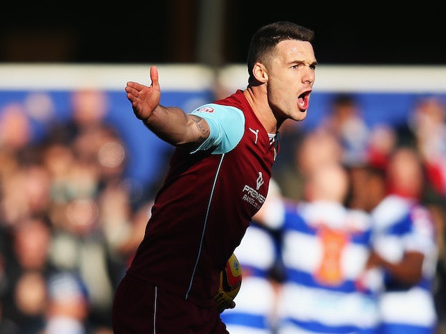 Burnley Captain Jason Shackell reacts to a Queens Park Rangers goal during the Sky Bet Championship match at Loftus Road on February 1, 2014