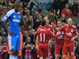 Liverpool's English midfielder Jonjo Shelvey (2R) celebrates after scoring the second goal during the English Premier League football match between Liverpool and Chelsea on May 8, 2012
