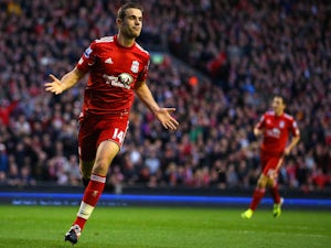 Jordan Henderson of Liverpool celebrates scoring their second goal during the Barclays Premier League match between Liverpool and Chelsea at Anfield on May 8, 2012