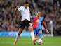 Kieran Richardson of Fulham is challenged by Thomas Ince of Crystal Palace during the Barclays Premier League match between Fulham and Crystal Palace at Craven Cottage on May 11, 2014