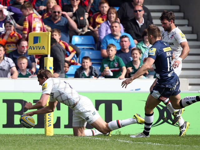 Toby Flood of Leicester Tigers goes over for his try during the Aviva Premiership match between Sale Sharks and Leicester Tigers at AJ Bell Stadium on May 3, 2014