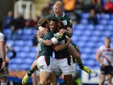 Andrew Fenby of London Irish celebrates his try with Marland Yarde and Tom Homer during the Aviva Premiership match between London Irish and Sale Sharks at the Madejski Stadium on May 10, 2014 