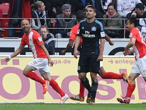 Mainz' Colombian midfielder Elkin Soto celebrates after scoring the 1-0 during the German first division Bundesliga football match FSV Mainz 05 vs Hamburger SV in Mainz, western Germany, on May 10, 2014