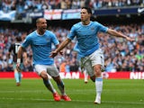 Samir Nasri of Manchester City celebrates scoring the first goal during the Barclays Premier League match between Manchester City and West Ham United at the Etihad Stadium on May 11, 2014