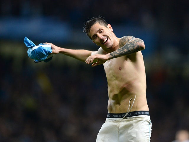 Manchester City's Montenegrin striker Stevan Jovetic celebrates scoring his team's third goal during the English Premier League football match between Manchester City and Aston Villa at the Etihad Stadium in Manchester, Northwest England, on May 7, 2014