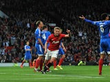 Manchester United's English striker James Wilson celebrates scoring the opening goal of the English Premier League football match between Manchester United and Hull City at Old Trafford in Manchester, northwest England on May 6, 2014