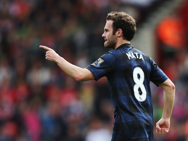 Juan Mata of Manchester United celebrates scoring during the Barclays Premier League match between Southampton and Manchester United at St Mary's Stadium on May 11, 2014