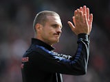 Manchester United's Serbian defender Nemanja Vidic thanks the fans after the English Premier League football match between Southampton and Manchester United at St Mary's stadium in in Southampton on May 11, 2014