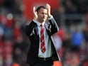 Manchester United's Interim manager Ryan Giggs thanks the fans after the English Premier League football match between Southampton and Manchester United at St Mary's stadium in in Southampton on May 11, 2014