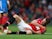  Phil Jones of Manchester United holds his shoulder after sustaining an injury during the Barclays Premier League match between Manchester United and Hull City at Old Trafford on May 6, 2014