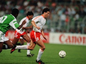 Holland's Marco van Basten dribbles the ball at the World Cup on June 12, 1990.