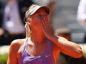 Sharapova battles past Stosur