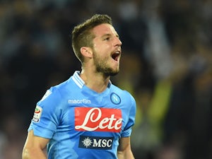 Dries Mertens of Napoli celebrates after scoring the opening goal during the Serie A match between SSC Napoli and Cagliari Calcio at Stadio San Paolo on May 6, 2014 