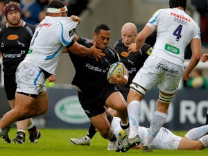 Sinoti Sinoti of Newcastle Falcons forces his way past Hoana Tui of Exeter Chiefs during the Aviva Premiership match between Newcastle Falcons and Exeter Chiefs at Kingston Park on May 10, 2014
