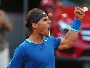 Nadal through in four sets