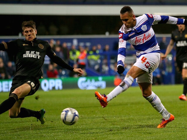 Ravel Morrison of Queens Park Rangers shoots at goal against Wigan Athletic during the Sky Bet Championship match at Loftus Road on March 25, 2014