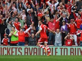 Rickie Lambert of Southampton celebrates after scoring during the Barclays Premier League match between Southampton and Manchester United at St Mary's Stadium on May 11, 2014