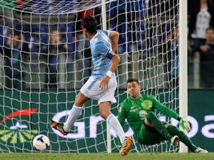 Stefano Mauri of SS Lazio scores the third team's goal during the Serie A match between SS Lazio and Hellas Verona FC at Stadio Olimpico on May 5, 2014