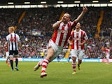Charlie Adam of Stoke City celebrates as he scores their second goal during the Barclays Premier League match between West Bromwich Albion and Stoke City at The Hawthorns on May 11, 2014