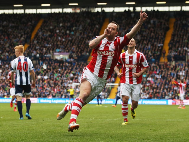 Charlie Adam of Stoke City celebrates as he scores their second goal during the Barclays Premier League match between West Bromwich Albion and Stoke City at The Hawthorns on May 11, 2014