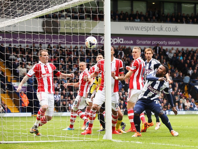 Stoke City repel a West Bromwich Albion attack during the Barclays Premier League match between West Bromwich Albion and Stoke City at The Hawthorns on May 11, 2014