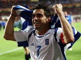 Midfielder Theodoros Zagorakis celebrates Greece winning the European Championships on July 04, 2004.