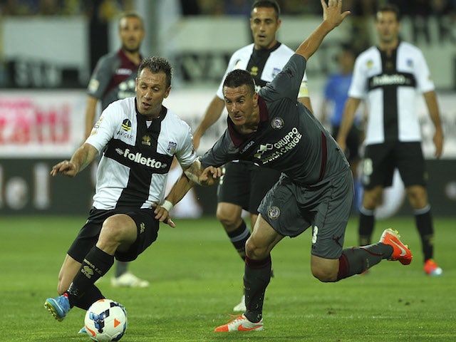Antonio Cassano of Parma FC competes for the ball with Ramos Borges Emerson of AS Livorno Calcio during the Serie A match on May 18, 2014