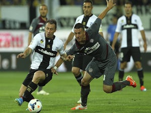 Antonio Cassano of Parma FC competes for the ball with Ramos Borges Emerson of AS Livorno Calcio during the Serie A match on May 18, 2014
