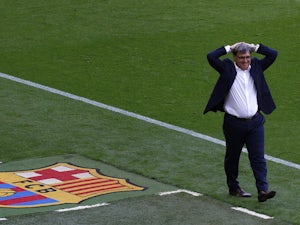 Barcelona's Argentinian coach Gerardo 'Tata' Martino reacts during the Spanish league football match FC Barcelona vs Club Atletico de Madrid at the Camp Nou stadium in Barcelona on May 17, 2014