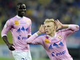 Evian's Danish defender Daniel Wass jubilates after scoring a goal during the French L1 football match Sochaux (FCSM) against Evian (ETGFC) on May 17, 2014