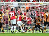 Laurent Koscielny of Arsenal scores their second goal during the FA Cup with Budweiser Final match between Arsenal and Hull City at Wembley Stadium on May 17, 2014