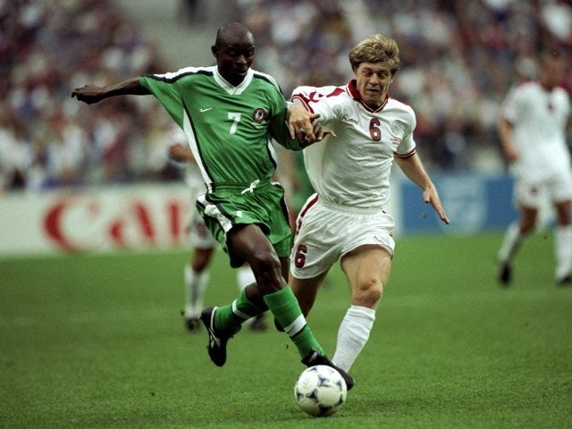 Winger Finidi George in action for Nigeria against Denmark on June 28, 1998.