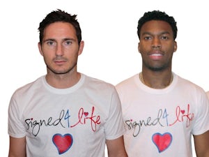 Chelsea's Frank Lampard and Liverpool striker Daniel Sturridge model Signed 4 Life t-shirts.