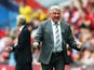 Steve Bruce, manager of Hull City celebrates during the FA Cup with Budweiser Final match between Arsenal and Hull City at Wembley Stadium on May 17, 2014