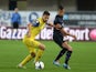 Ivan Radovanovic (L) of Chievo Verona competes with Saphir Slitti Taider of Internazionale Milano during the Serie A match on May 18, 2014