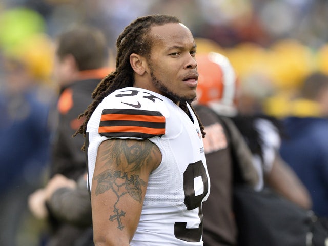 Linebacker Jabaal Sheard #97 of the Cleveland Browns stands on the field during warmups before the game against the Green Bay Packers at Lambeau Field on October 20, 2013