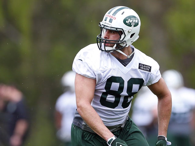 Tight End Jace Amaro #88 of the New York Jets runs a play during the first day of rookie minicamp on May 16, 2014