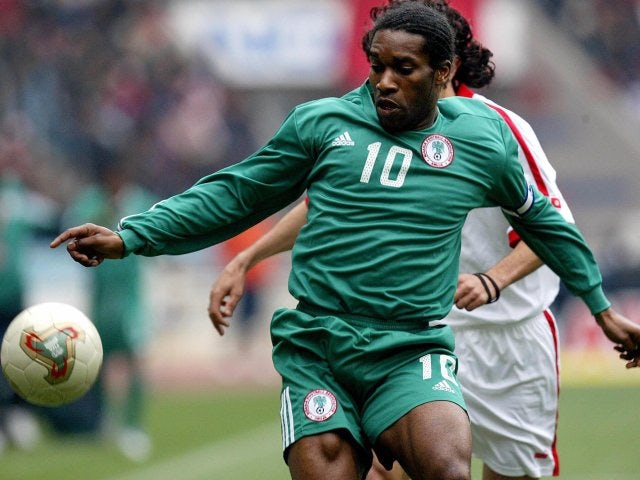 Former Bolton Wanderers midfielder Jay Jay Okocha in action for Nigeria on February 11, 2004.