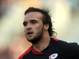 Jean-Baptiste Bruzulier of Saracens runs with the ball during the J.P. Morgan Premiership Rugby Sevens Series Final at Twickenham Stoop on August 5, 2011