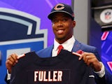 Kyle Fuller of the Virginia Tech Hokies poses with a jersey after he was picked #14 overall by the Chicago Bears during the first round of the 2014 NFL Draft  on May 8, 2014