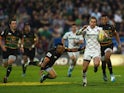 Mathew Tait of Leicester Tigers avoids a tackle from Kahn Fotuali'i of Northampton Saints during the Aviva Premiership Semi Final match between Northampton Saints and Leicester Tigers at Franklin's Gardens on May 16, 2014