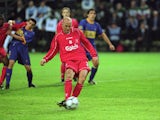 Gary McAllister of Liverpool scores from the penalty spot during the UEFA Cup Final against Deportivo Alaves on May 16, 2001