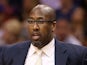 Head coach Mike Brown of the Cleveland Cavaliers watches from the bench during the NBA game against the Phoenix Suns at US Airways Center on March 12, 2014 